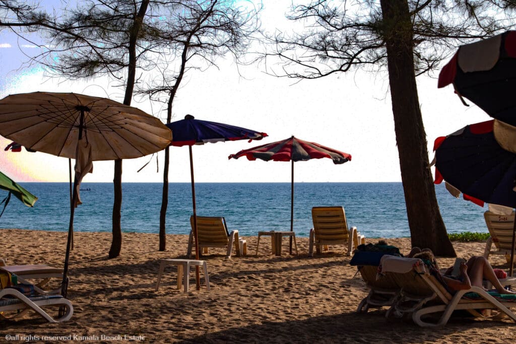 Relaxing view of Layan Beach in Phuket with beach umbrellas and lounge chairs